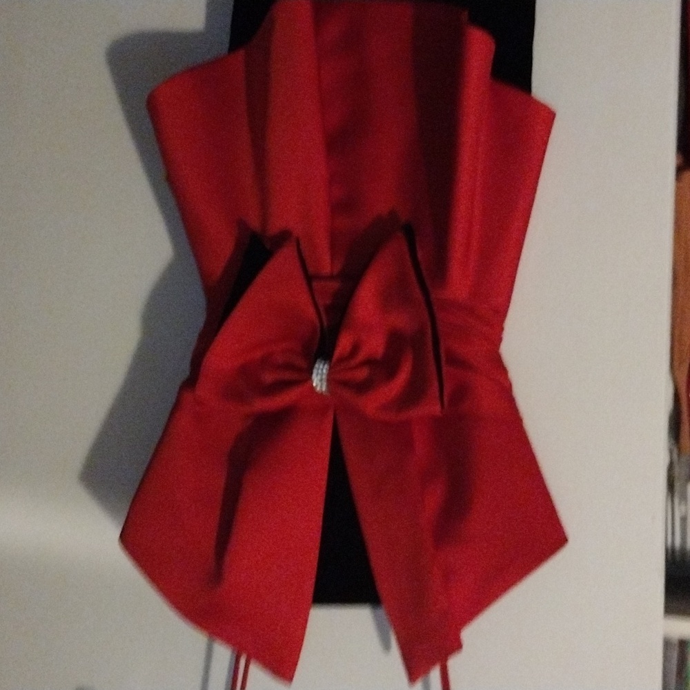 Size 12 black evening gown with rhinestones on the bow all intact